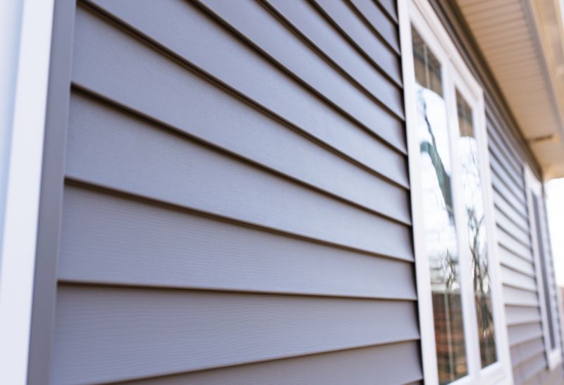 Grey Vinyl Siding Installation